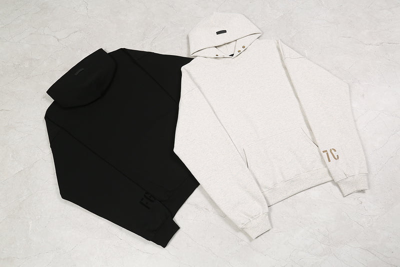 Black and white hoodie and sweatshirt, K-pop merchandise, stylish casual wear for fans.