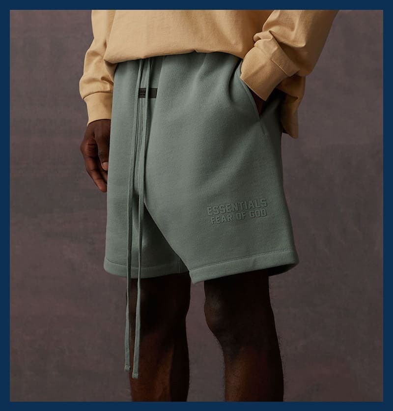 Essentials fear of god jogger shorts with drawstrings, relaxed fit, and embossed logo, men's casual streetwear fashion, comfortable and stylish athleisure shorts for everyday wear.