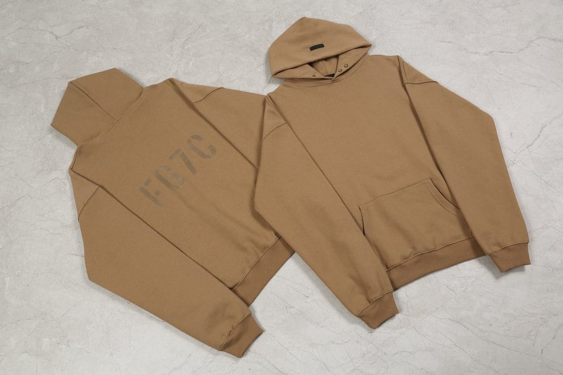 Famous Kpop merch hoodies in beige color, featuring bold branding and comfortable design. Perfect for fans to showcase their love for Kpop groups and music.