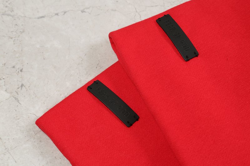 Hoodie with "twice" and "groom" labels, red fabric, trendy K-pop merchandise, casual fashion accessory, popular among K-pop fans.