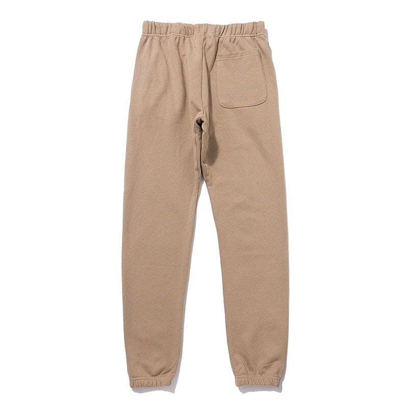 Comfy beige jogger pants with elastic waistband and cuffed ankles for casual wear, ideal for cozy loungewear or stylish streetwear, perfect for pairing with K-pop merch accessories.