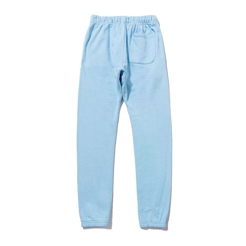 Comfy blue sweatpants with elastic waistband and side pocket, perfect for casual wear and loungewear, suitable for any gender and everyday use.