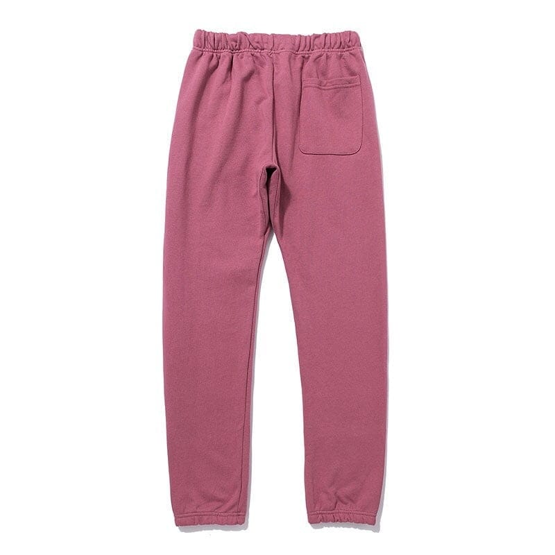 Pink fleece joggers with elastic waistband and back pocket, casual and comfortable kpop merch.