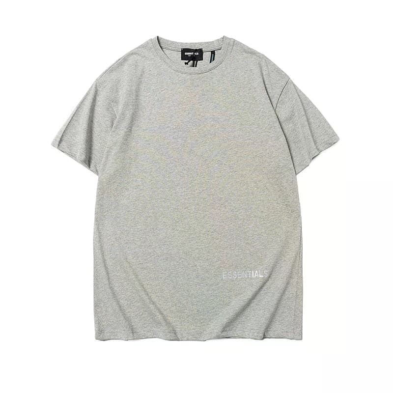 Grey oversized t-shirt with "ESSENTIALS" text, perfect for casual kpop merch style.