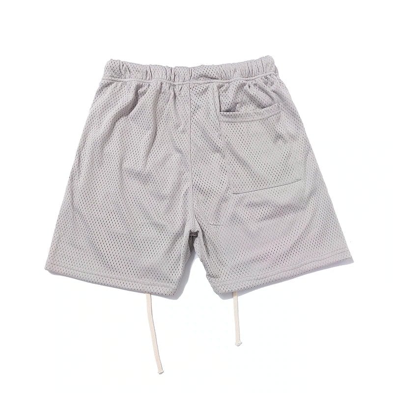 Mesh shorts with drawstrings, casual athletic wear, light gray color, breathable fabric perfect for sports or leisure activities.