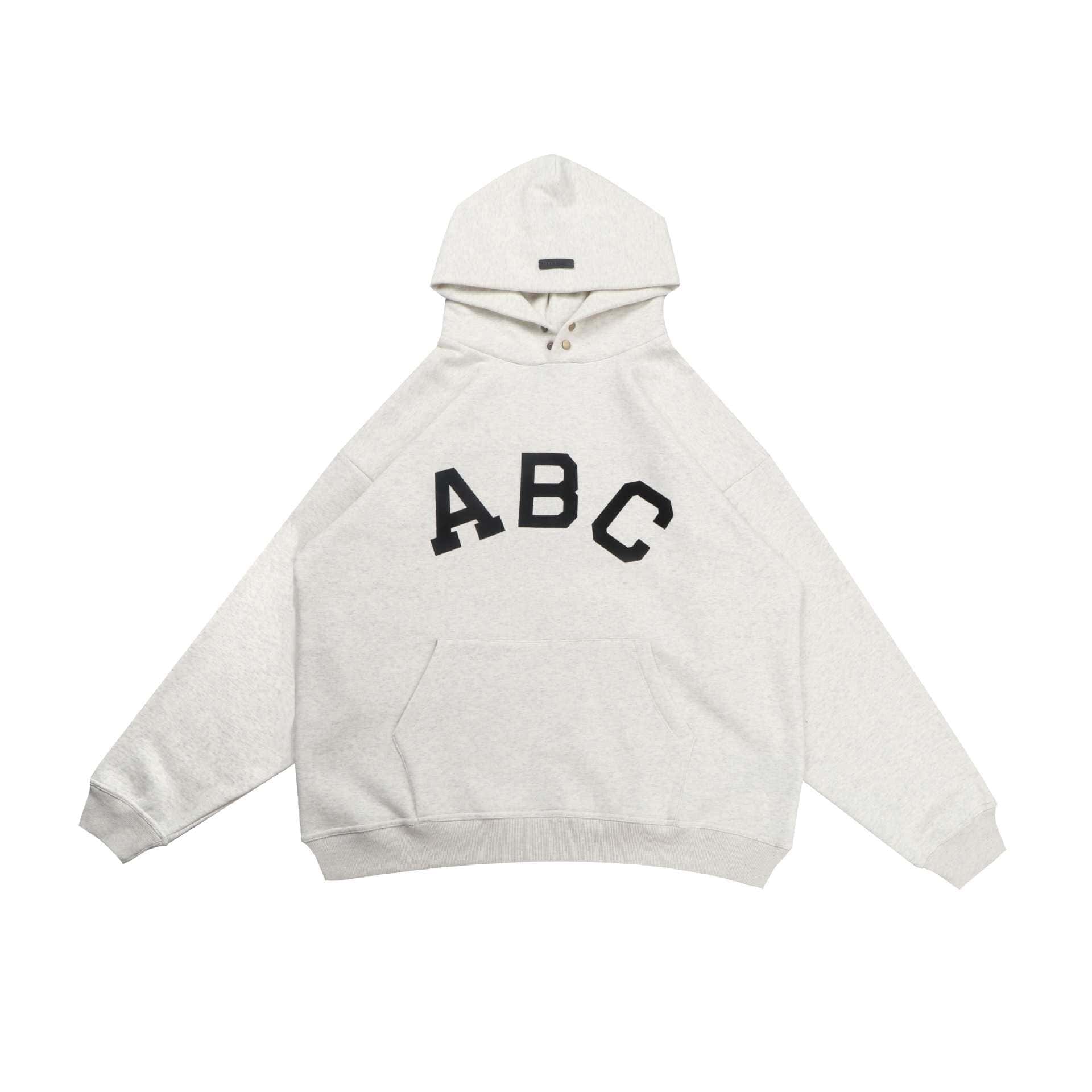 Comfy white hoodie with black ABC letters, perfect for K-pop fans and streetwear lovers.