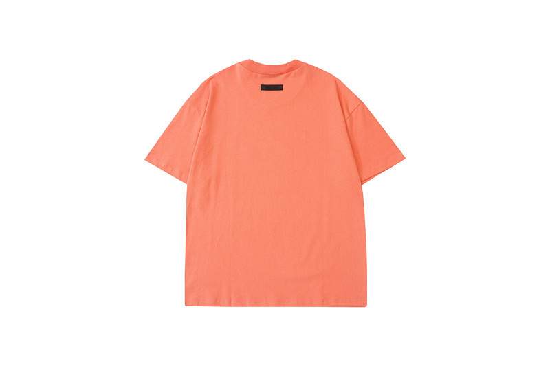 Orange oversized t-shirt with black tag, casual streetwear, popular K-pop merchandise for fans.