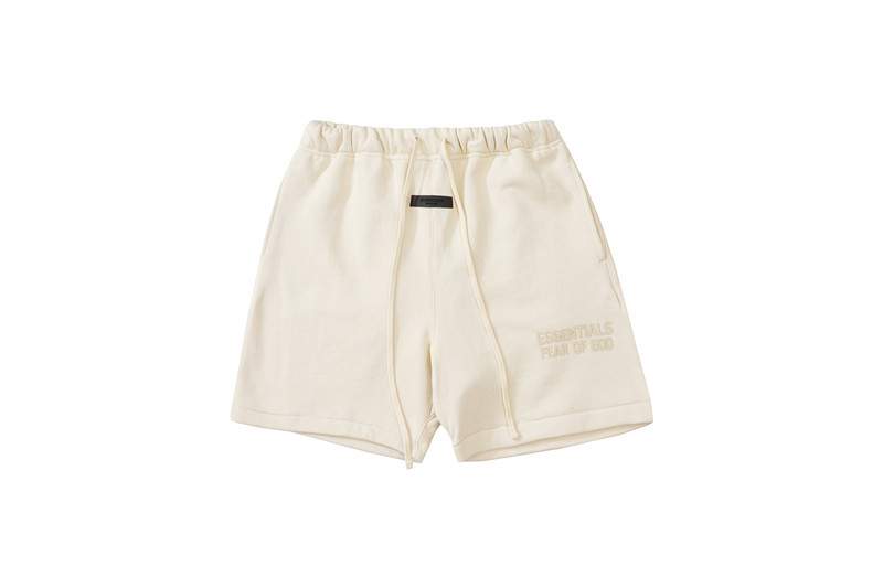 Comfy cream-colored shorts with a drawstring waistband, casual and stylish, perfect for everyday wear or lounging.