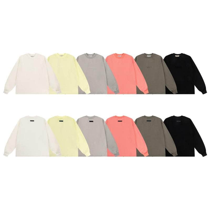 2. Multiple colorful sweatshirts in white, yellow, gray, pink, taupe, and black, perfect for K-pop merch fans.