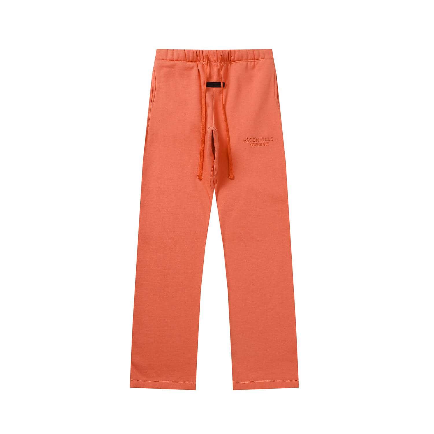 Relaxed-fit orange sweatpants with adjustable drawstring waistband and embroidered text, perfect for casual wear and K-pop merchandise collections.