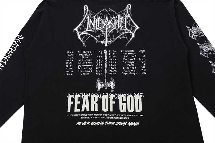 Black and white K-pop concert sweatshirt with metallic band logo and tour dates, featuring "Fear of God" text and Gothic-inspired design elements, perfect for fans and collectors.