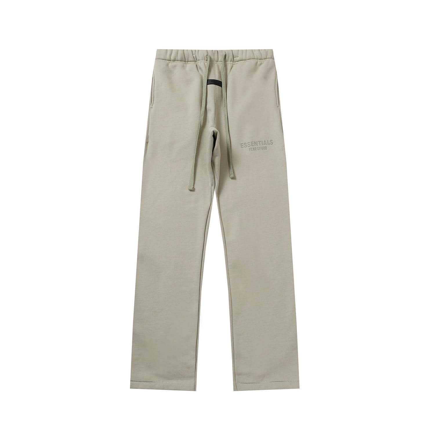 Relaxed fit beige sweatpants with drawstring waist and embroidered logo detail, perfect for casual K-pop fan apparel.