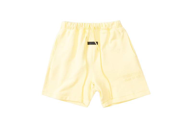 Soft yellow K-pop merchandise shorts for fans of Korean pop idols, stylish and comfortable, perfect for casual wear or concerts.