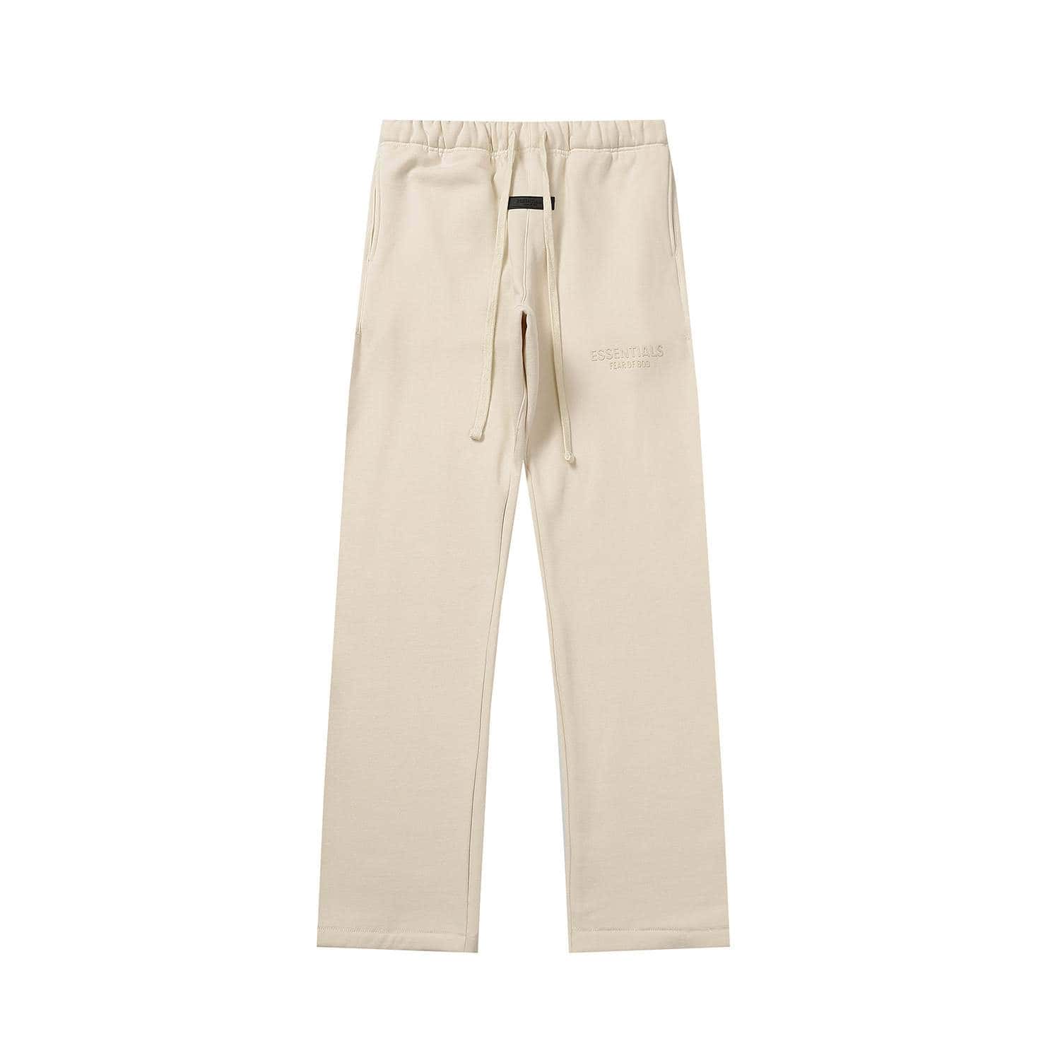 Comfy beige sweatpants with drawstring waist and embroidered text, ideal for casual K-pop fan outfits. Perfect for fans who love stylish and comfortable K-pop merchandise essential items.