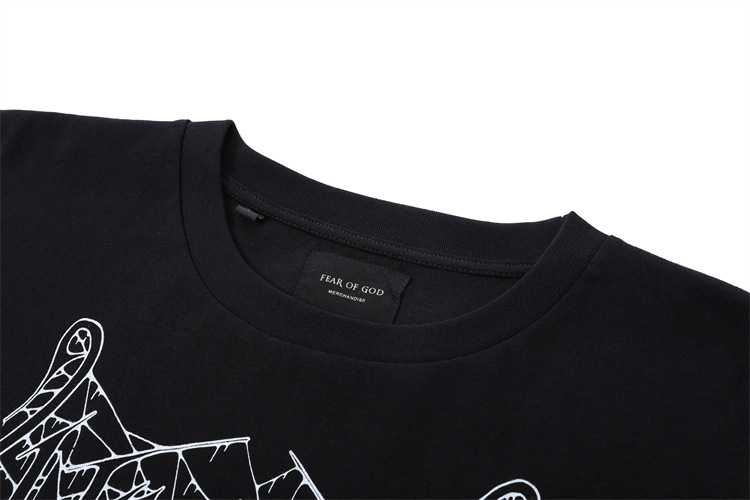 Fear of god black graphic t-shirt with spider web design, streetwear style, popular among K-pop merchandise fans, high-quality fabric, comfortable fit, limited edition.