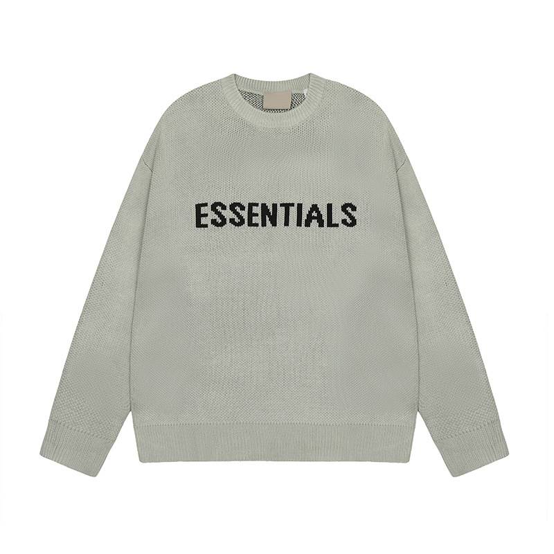 ESSENTIALS sweatshirt with black text on light grey knit background, casual streetwear style for K-pop fans and merch collectors.