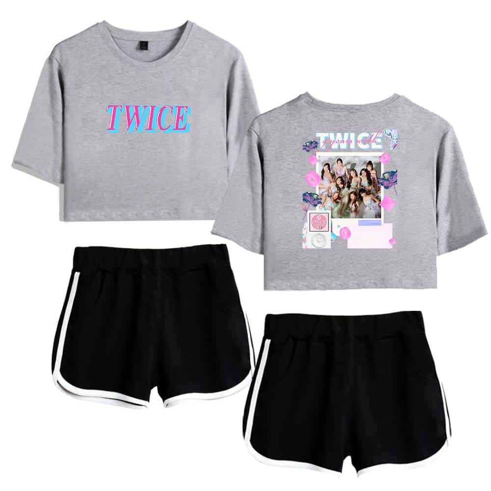 Twice kpop merch gray cropped T-shirt with "TWICE" text and group photo, stylish black athletic shorts with white trim, trendy apparel for K-pop fans and TWICE enthusiasts.